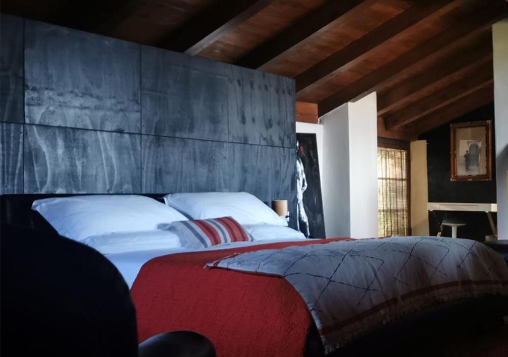 Postel nebo postele na pokoji v ubytování B&B con SPA il Castello di Lucawest
