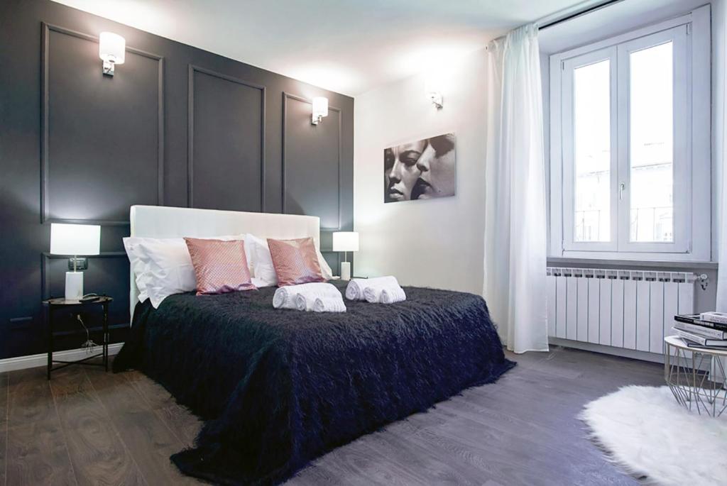 Ένα ή περισσότερα κρεβάτια σε δωμάτιο στο ChicLife SARONA Shenkin - Borgo Santa Caterina & Museum