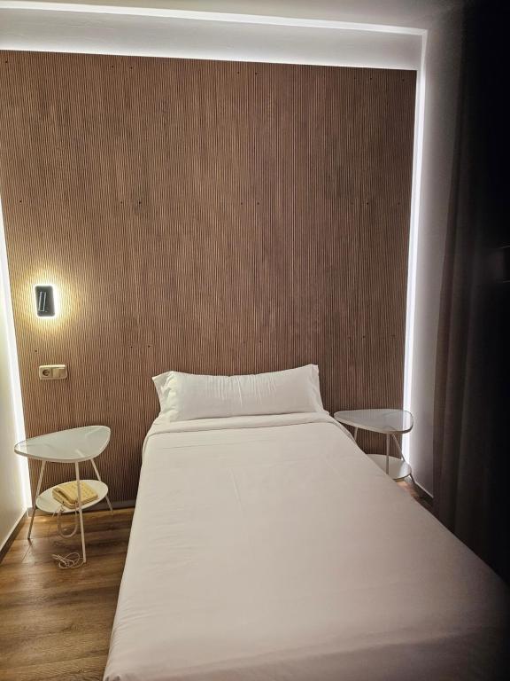 Postel nebo postele na pokoji v ubytování Hotel Villasegura