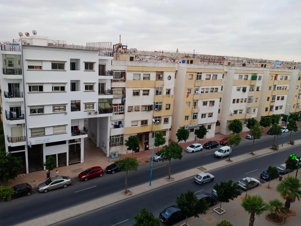 an overhead view of a city street with buildings at Appartement propre et bien équipé à Ain sebaa in Casablanca