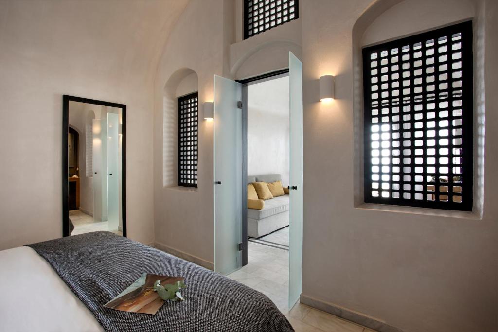 Postel nebo postele na pokoji v ubytování Andromeda Villas & Spa Resort