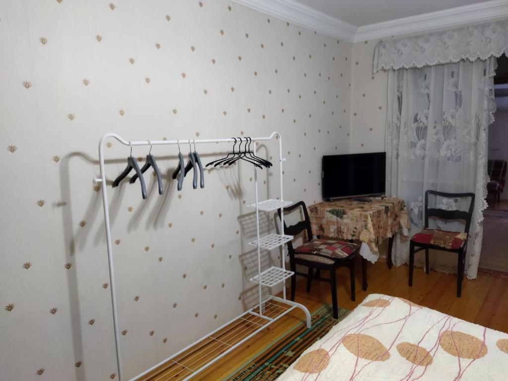 Postel nebo postele na pokoji v ubytování Бабушкин уют в РУСТАВИ