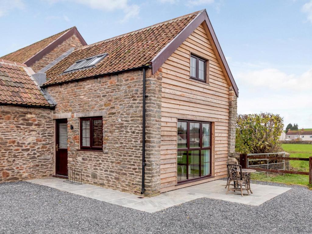 a stone cottage with a pitched roof at 1 bed in Bath 72835 in Chew Magna
