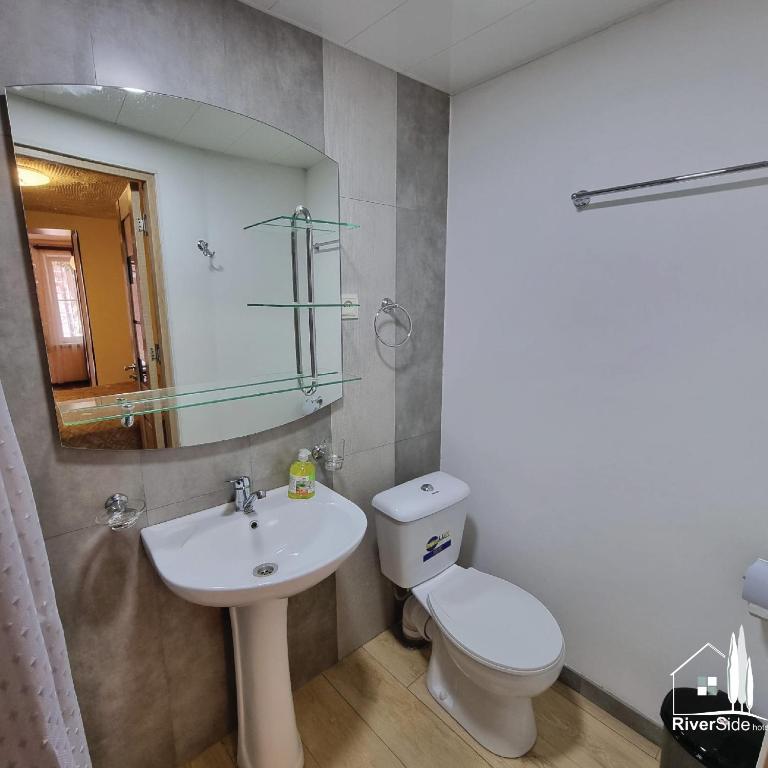 Koupelna v ubytování River House Boutique Hotel