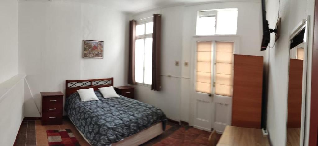 Postel nebo postele na pokoji v ubytování La Otra Vista