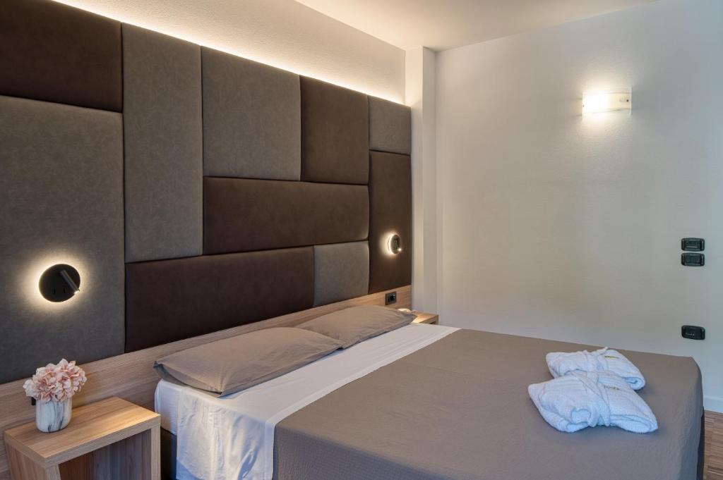 Postel nebo postele na pokoji v ubytování Residence Al Frantoio