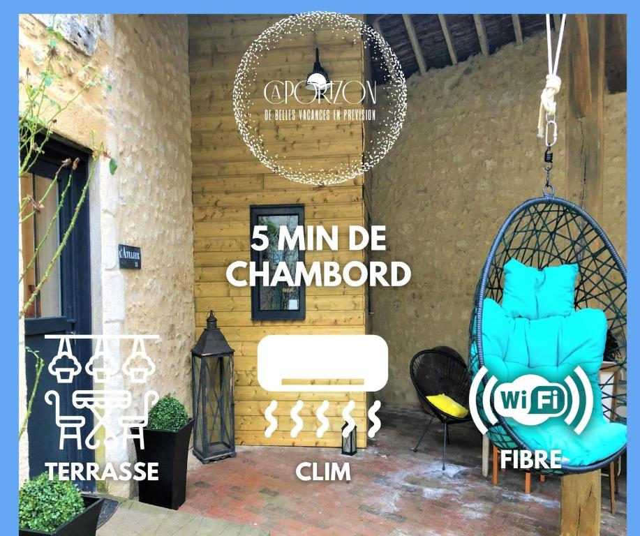 a sign that reads min be chambord on a patio at Caporizon-L'Atelier-Aux portes du chateau de Chambord in Saint-Claude-de-Diray