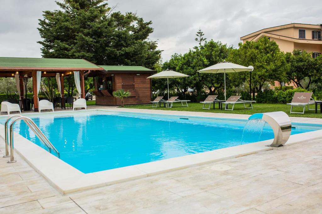 The swimming pool at or close to Green Oasis Gabella