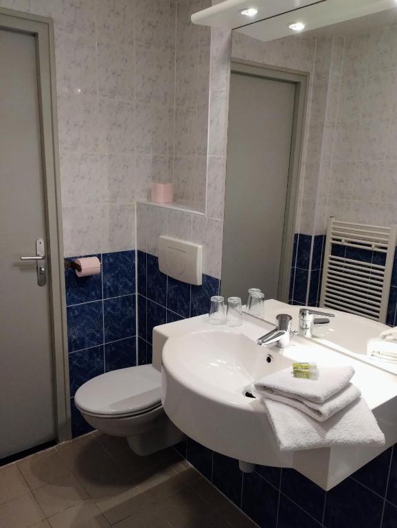Koupelna v ubytování Hotel Rêve de la Vallée