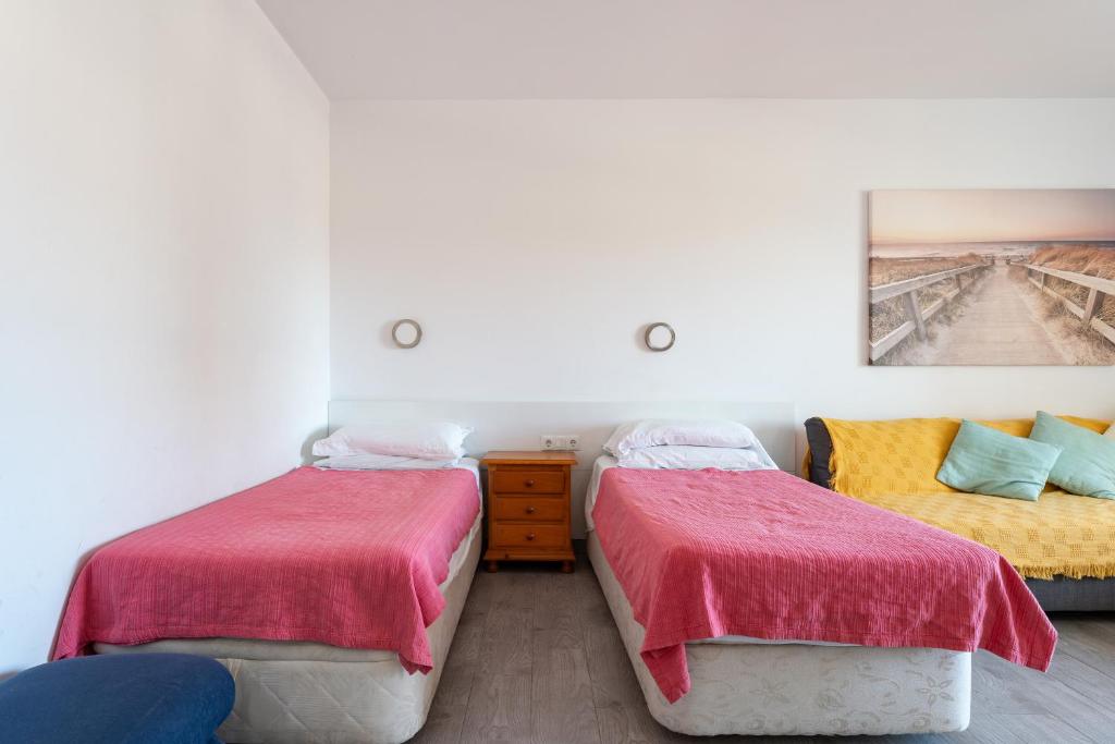 Posteľ alebo postele v izbe v ubytovaní Pyr studio apartment