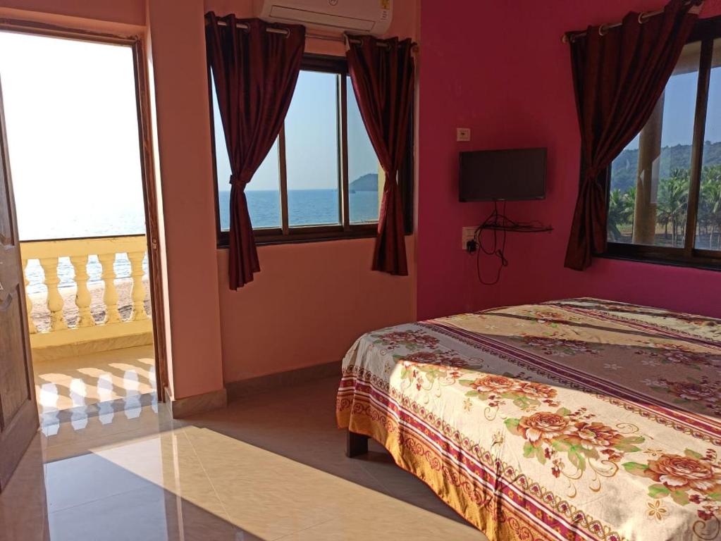 Postel nebo postele na pokoji v ubytování Saguntara Beach Homestay