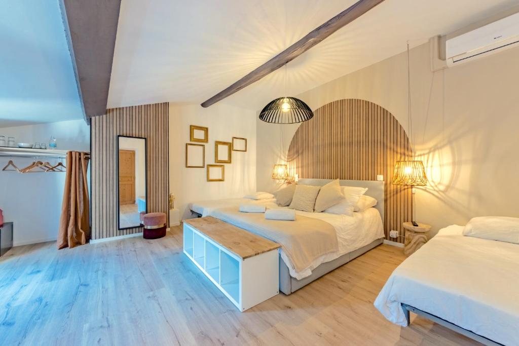 Llit o llits en una habitació de L'Oliveraie d'Eurocentre - Toulouse Nord