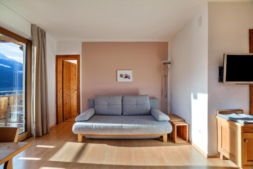 TV a/nebo společenská místnost v ubytování Langstein Wohnung Rose