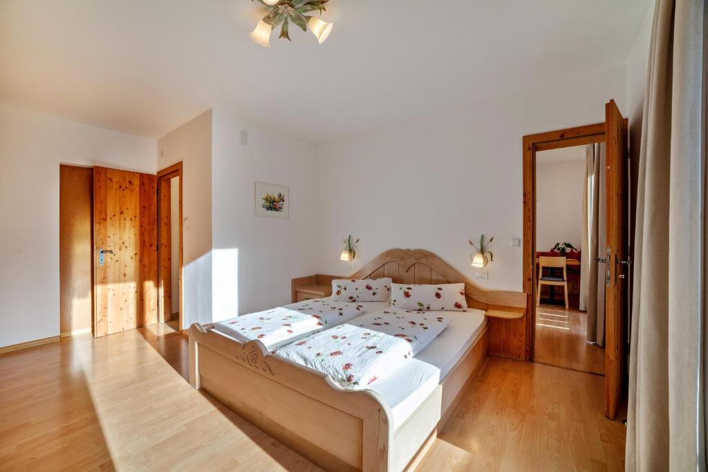 Postel nebo postele na pokoji v ubytování Langstein Wohnung Rose
