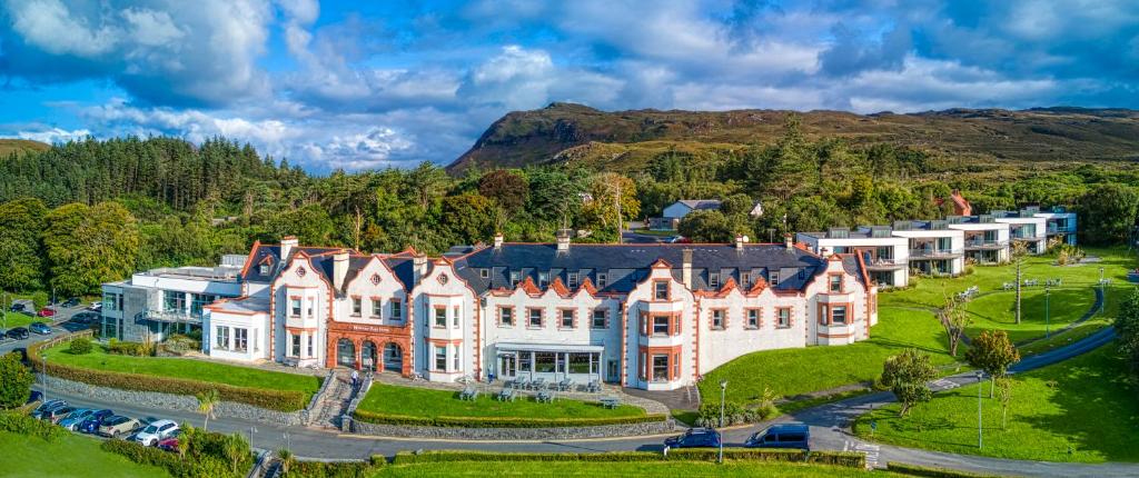 an aerial view of a large house on a hill at Mulranny Park Hotel in Mulranny