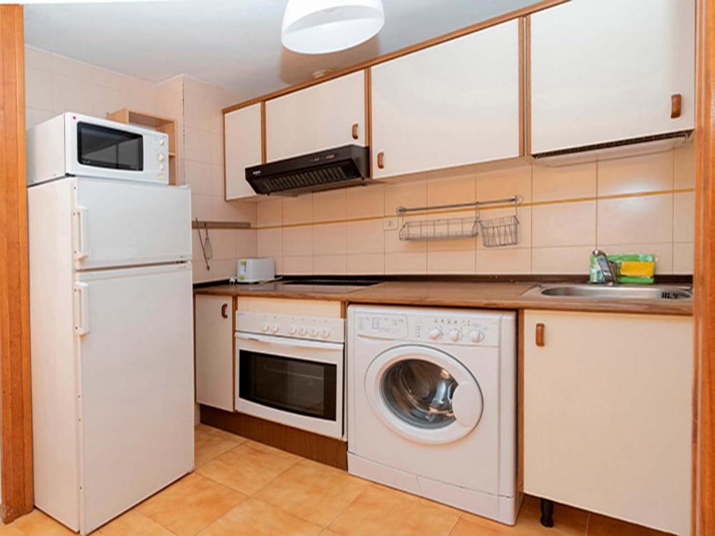 Kuchyň nebo kuchyňský kout v ubytování Apartamentos Villanua 3000