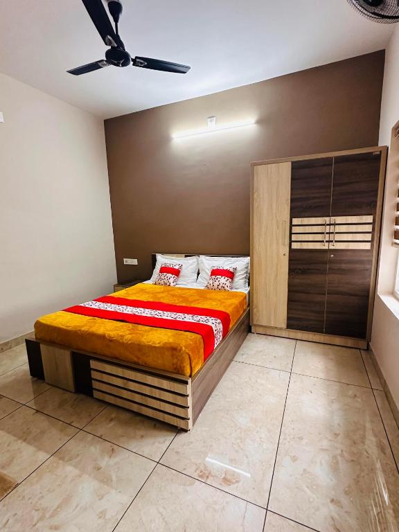 Postel nebo postele na pokoji v ubytování Luxe Hotel - Rooms & Villas Wayanad