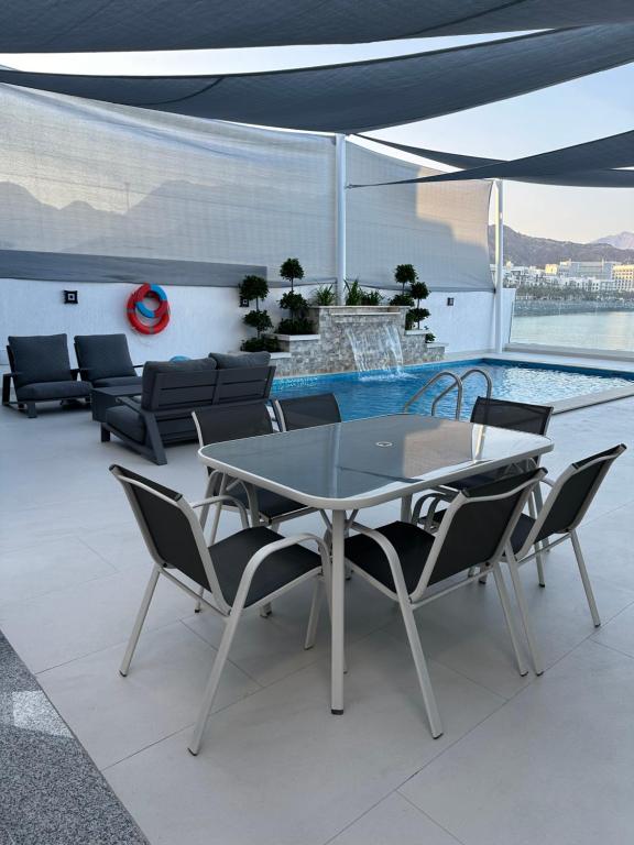 Posezení v ubytování Al Dana Sea View Villa