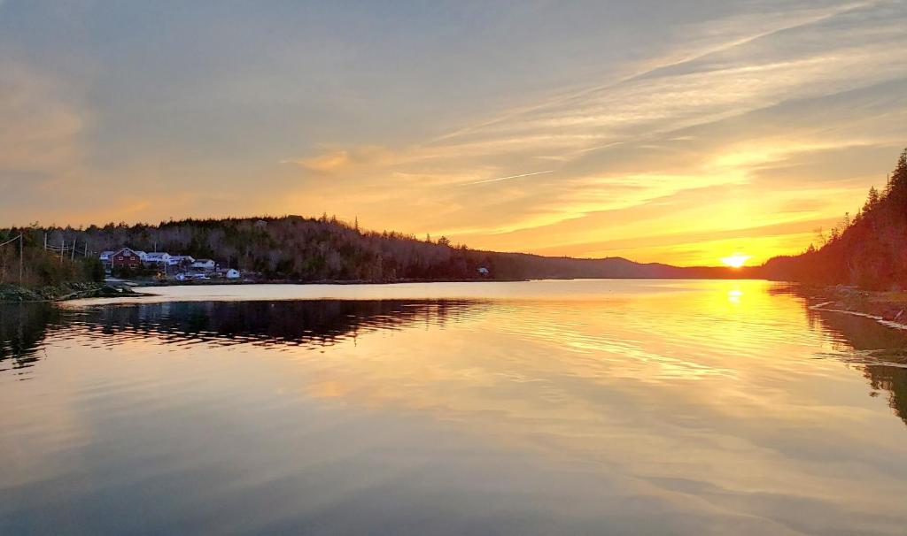 a view of a lake at sunset at Jeddore Lodge in Head of Jeddore