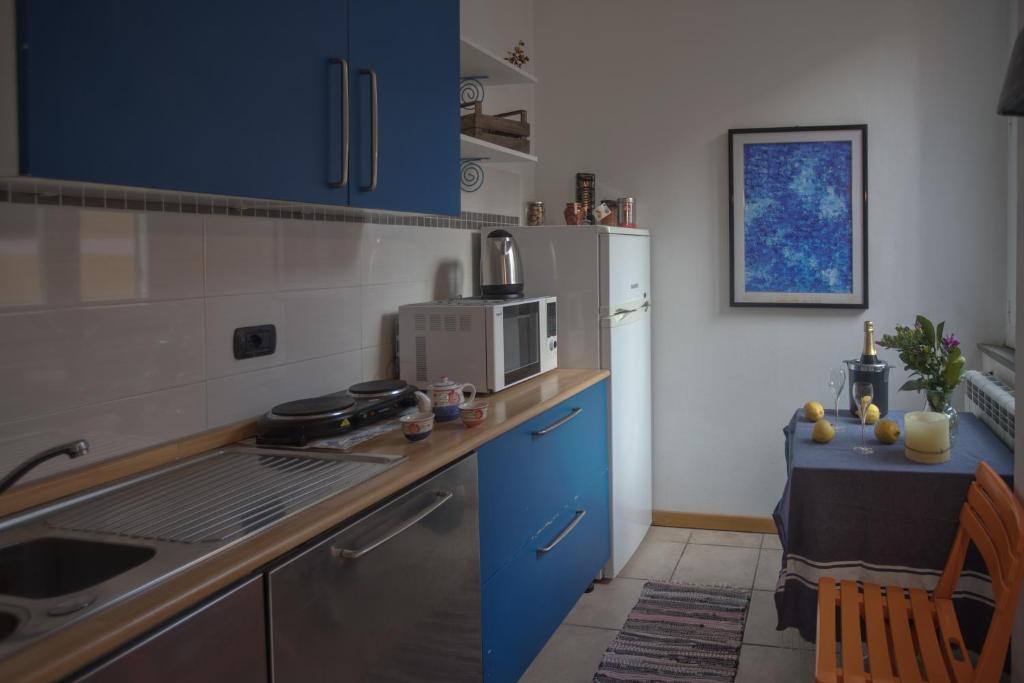 Kuchyň nebo kuchyňský kout v ubytování Lisetta Rooms