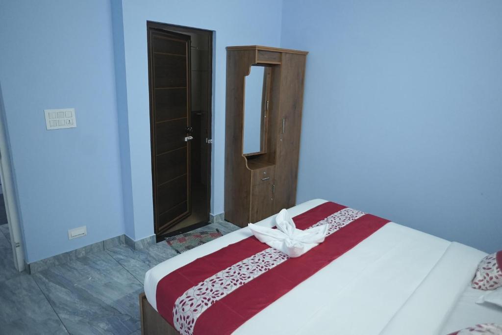 Postel nebo postele na pokoji v ubytování Luxe Hotel - Rooms & Villas Wayanad