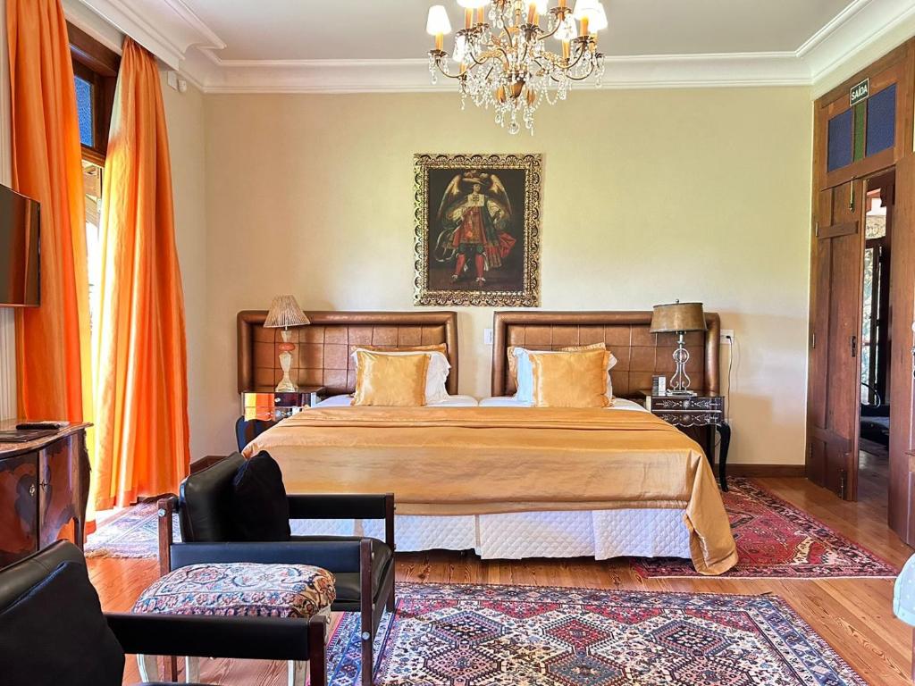 Postel nebo postele na pokoji v ubytování Villa Maria Pousada de Charme