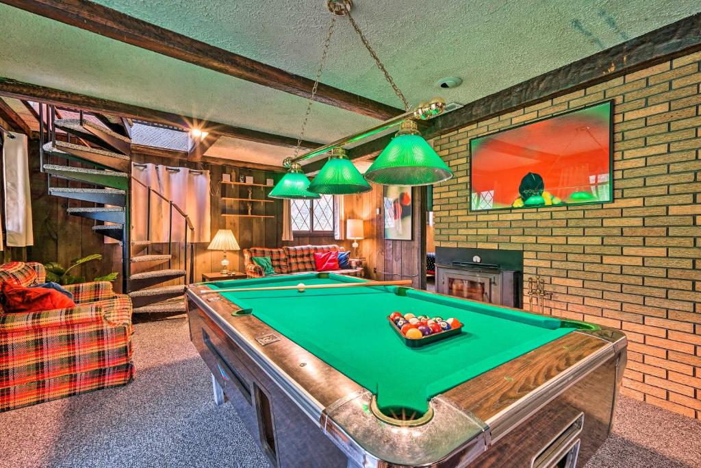 a living room with a pool table in it at Fresh and Retro Chalet Fire Pit, 4 Min to Gore Mtn in North Creek