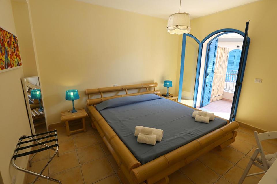 Postel nebo postele na pokoji v ubytování Le Saline Resort