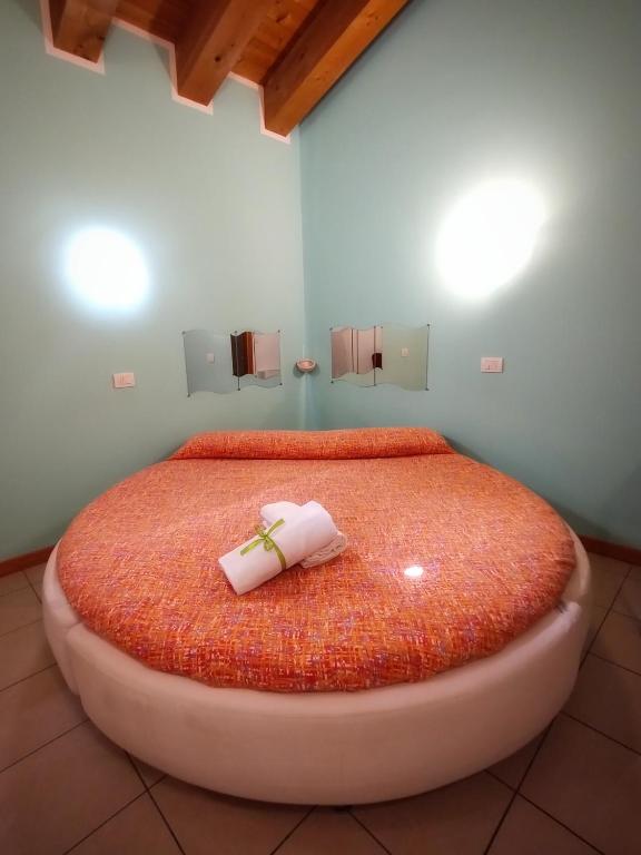 Postel nebo postele na pokoji v ubytování Quadrifoglio Relax