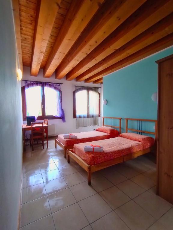 Postel nebo postele na pokoji v ubytování Quadrifoglio Relax
