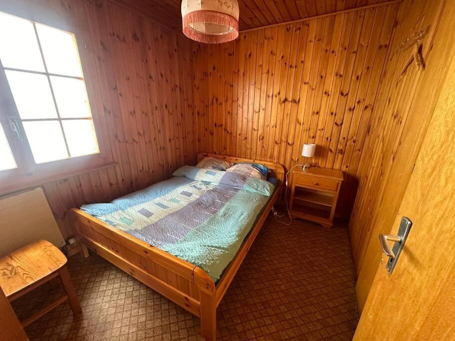 Postel nebo postele na pokoji v ubytování Les Rhodos