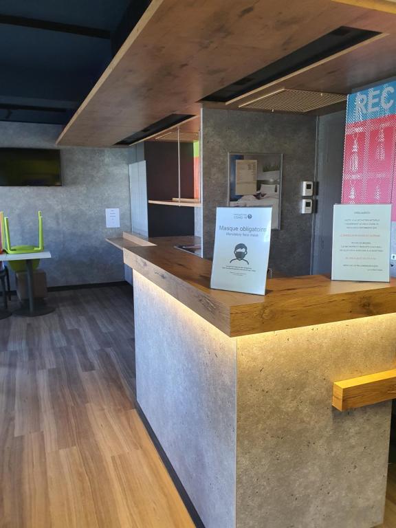 Kuchyň nebo kuchyňský kout v ubytování Accueil Hotel Besançon