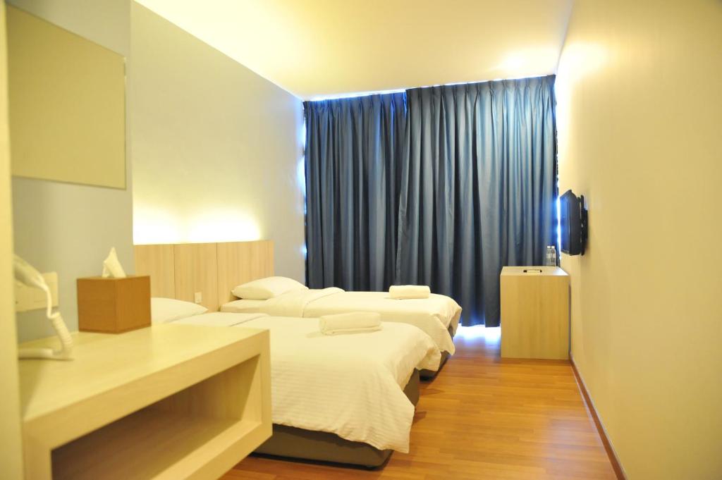 Postel nebo postele na pokoji v ubytování Inn86