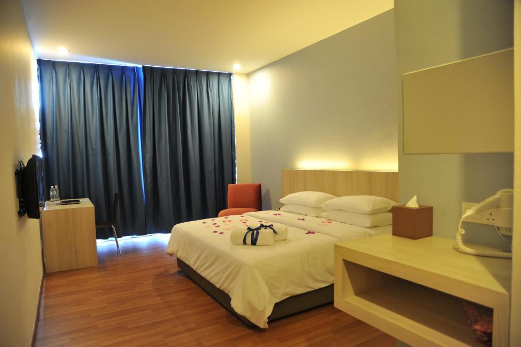 Postel nebo postele na pokoji v ubytování Inn86