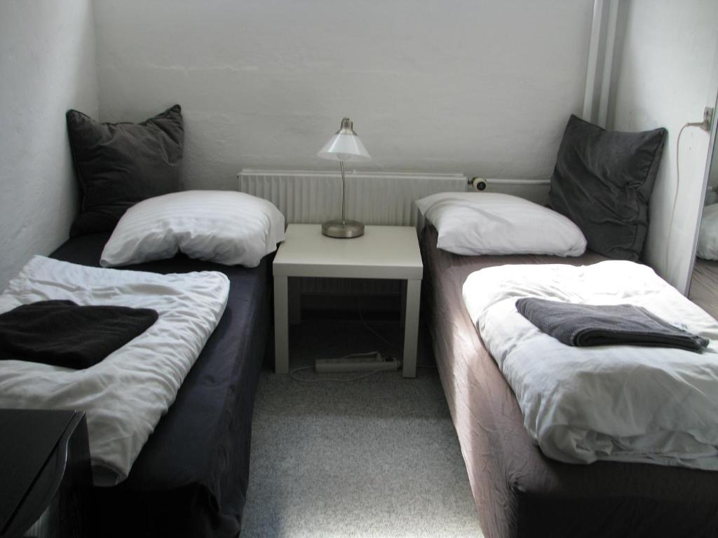 Postel nebo postele na pokoji v ubytování Amazing Herlev