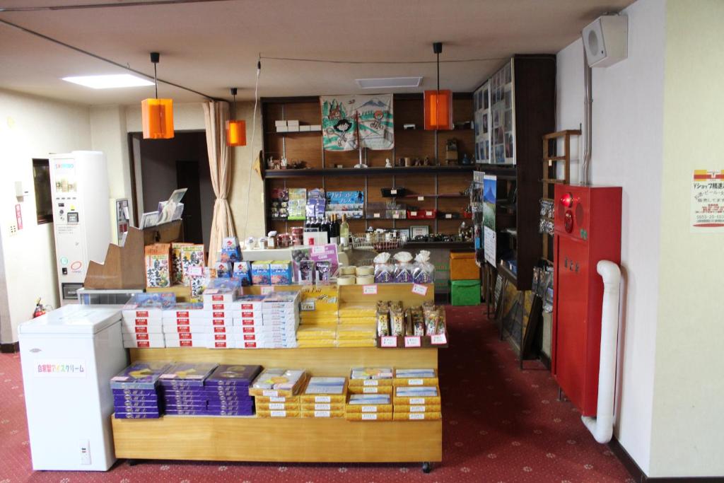 a store with a display of products in a room at Yamadaya Hotel in Fujikawaguchiko