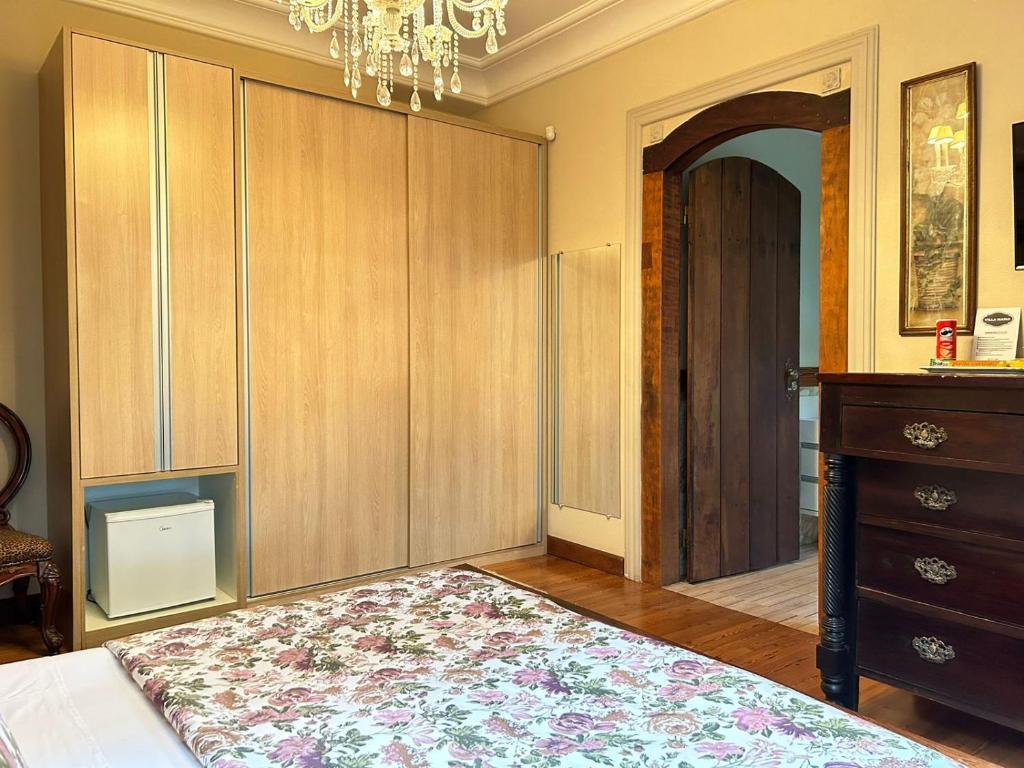 Postel nebo postele na pokoji v ubytování Villa Maria Pousada de Charme