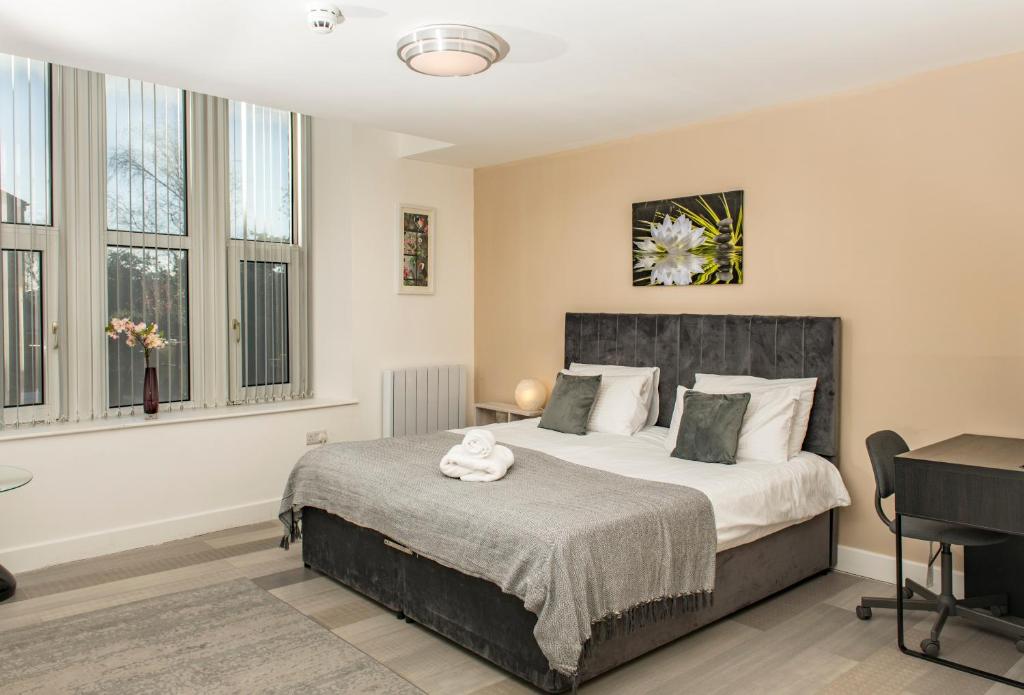 Postel nebo postele na pokoji v ubytování Cozy Studio Flat for Rent