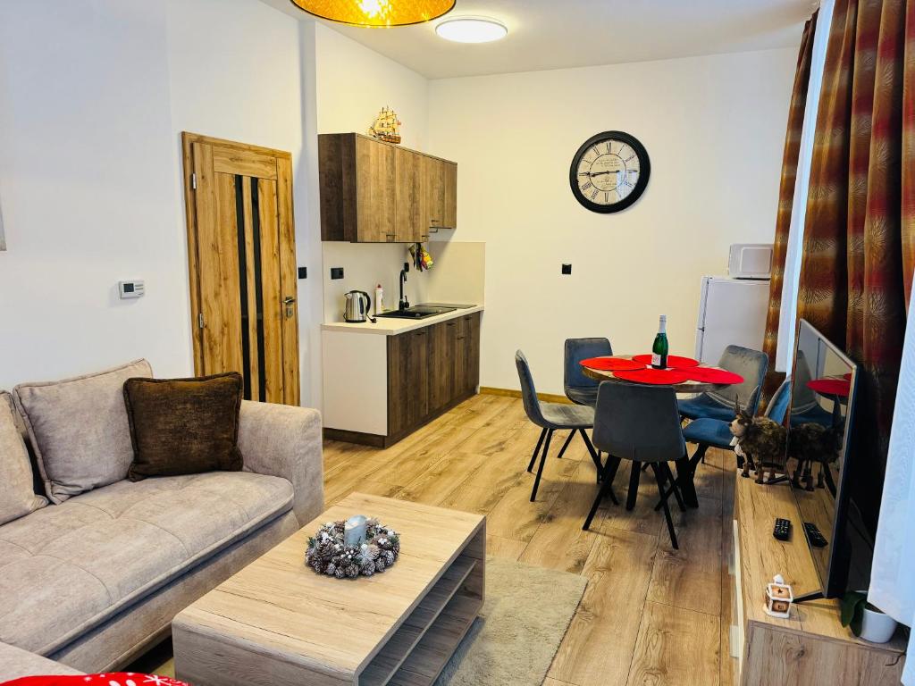 Kuchyň nebo kuchyňský kout v ubytování Apartmány KAMZÍK Donovaly