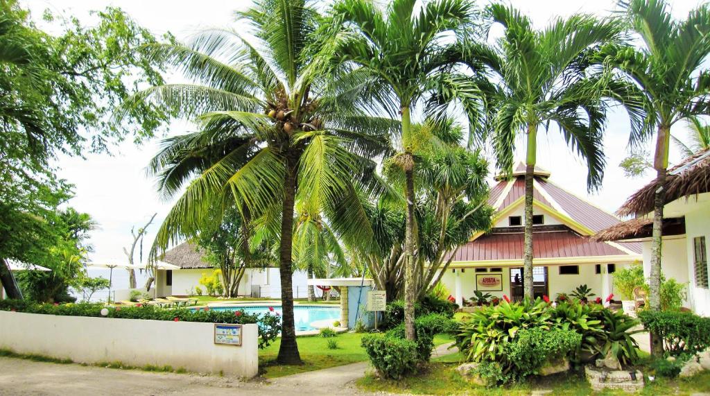 Zahrada ubytování Quo Vadis Dive Resort