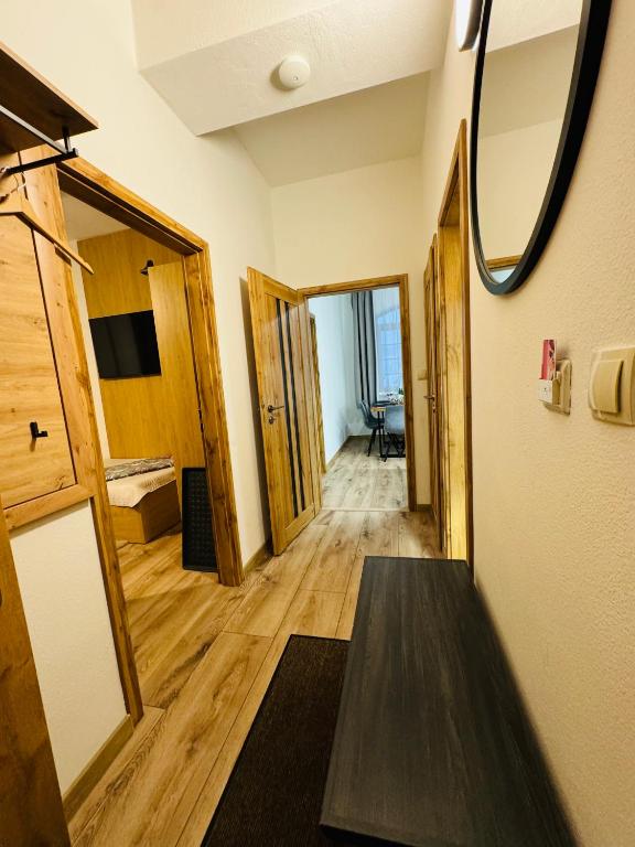 TV a/nebo společenská místnost v ubytování Apartmány KAMZÍK Donovaly