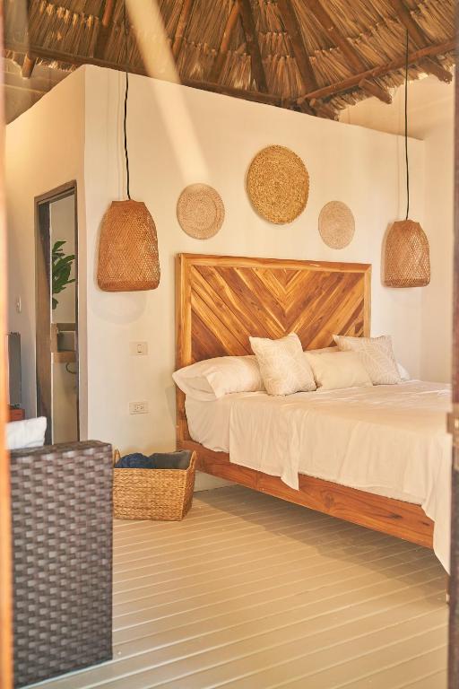 Postel nebo postele na pokoji v ubytování Mangata Beach
