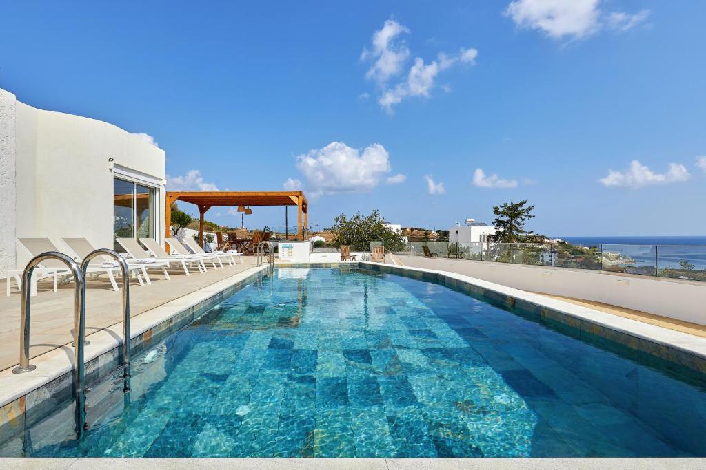 Bazén v ubytování Villa Elena Agia Pelagia - with private heated swimming pool and great sea view nebo v jeho okolí