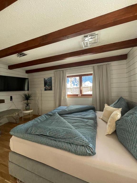 Postel nebo postele na pokoji v ubytování Ferienwohnung Jägerheim