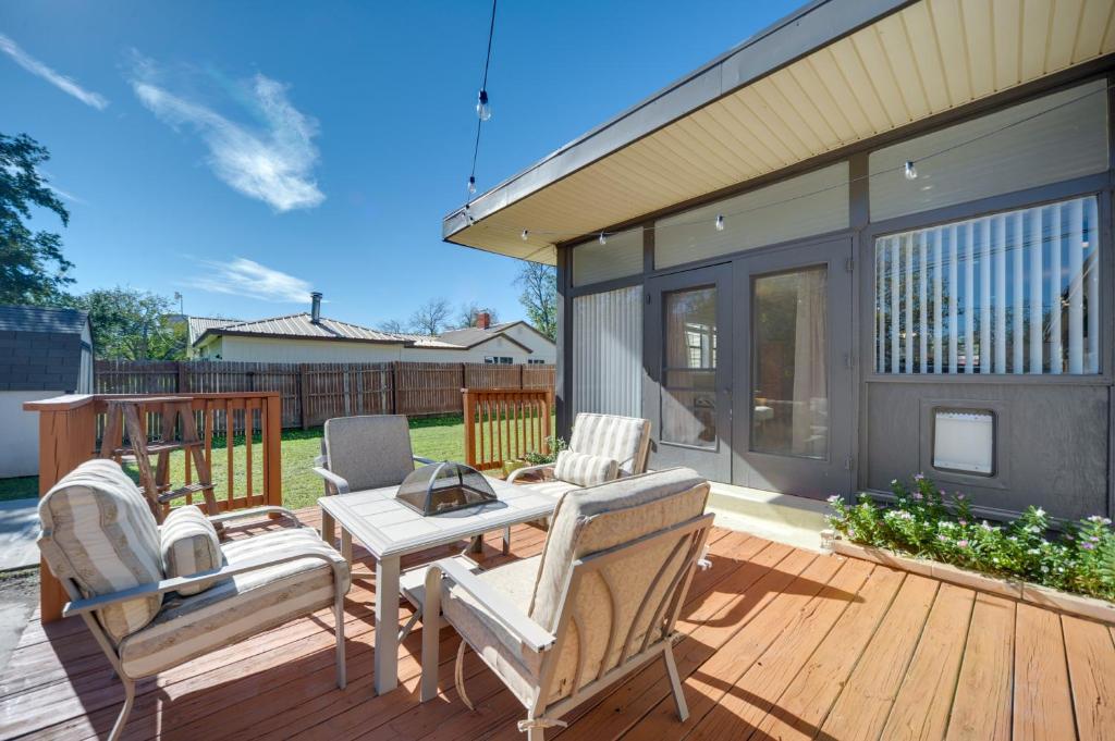 a patio with a table and chairs on a deck at Pet-Friendly Brady Vacation Home Near Wineries! in Brady