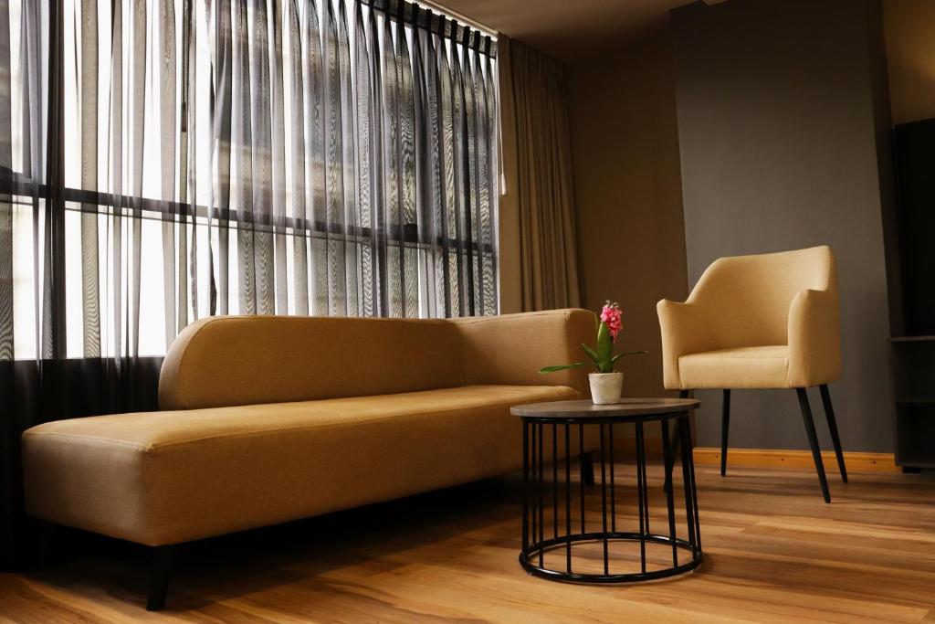 Posezení v ubytování Giluxe Hotel