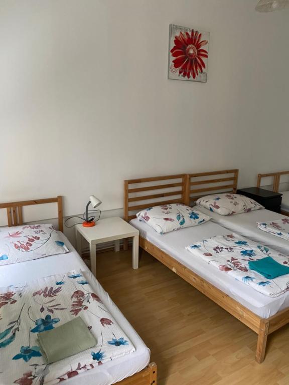 Postel nebo postele na pokoji v ubytování Apartments Nora