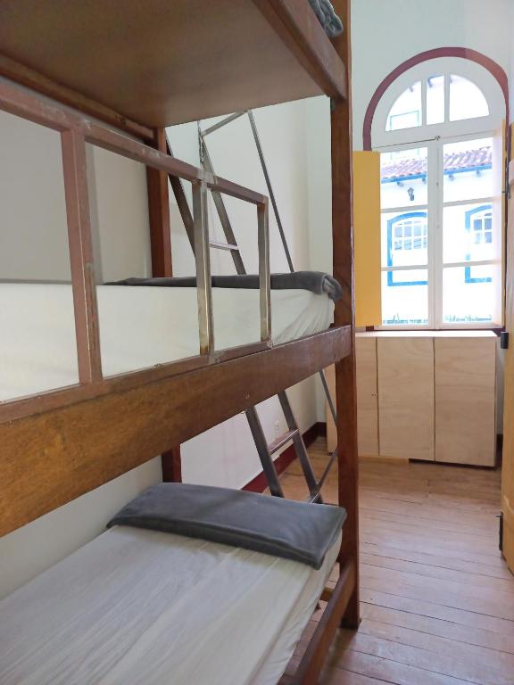Postel nebo postele na pokoji v ubytování É Hostel