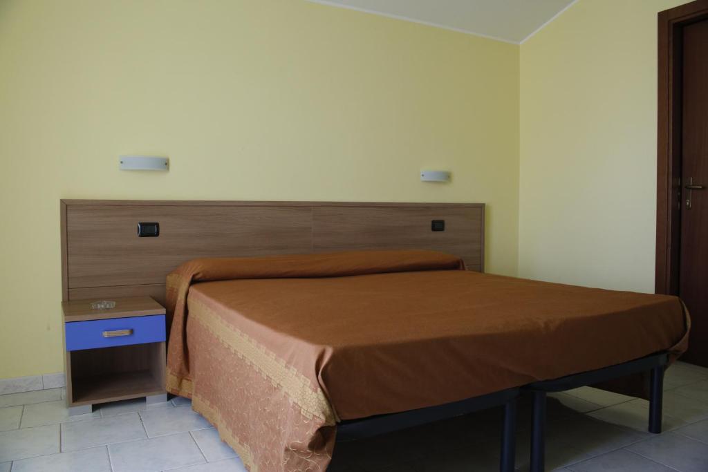 Postel nebo postele na pokoji v ubytování Hotel Narnia