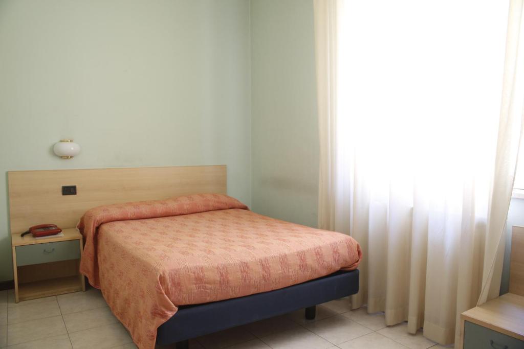 Postel nebo postele na pokoji v ubytování Hotel Narnia